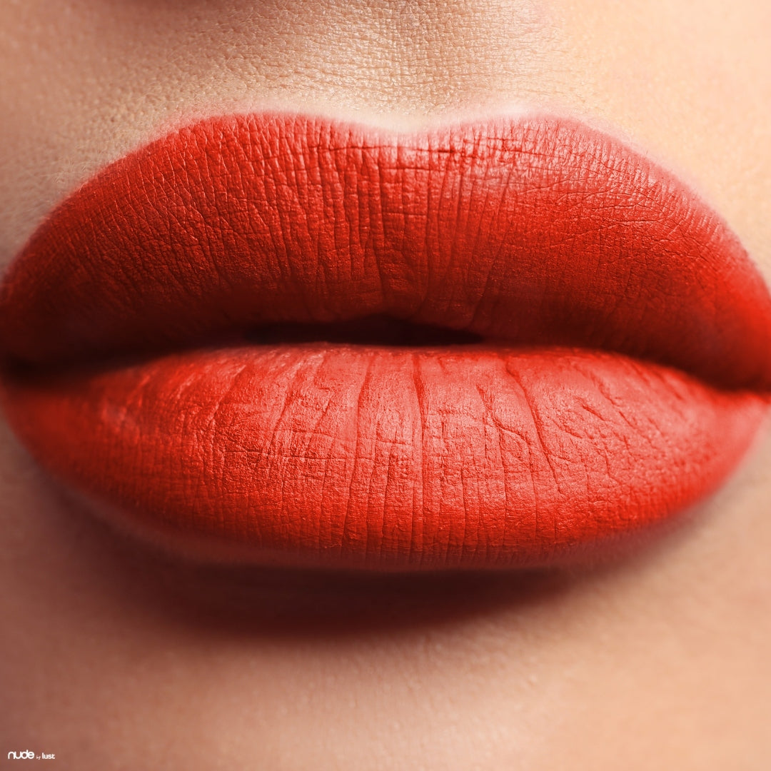 Tangerine orange lipstick from Nude by Lust