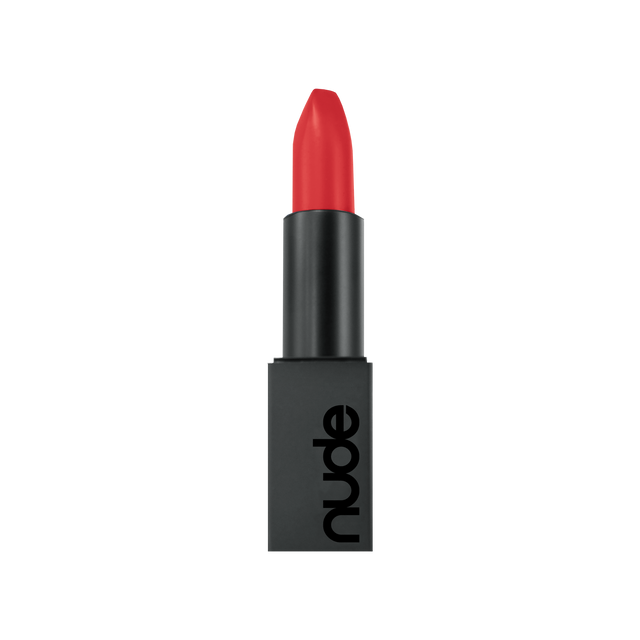 Desire is a coral red lipstick from Nude by Lust