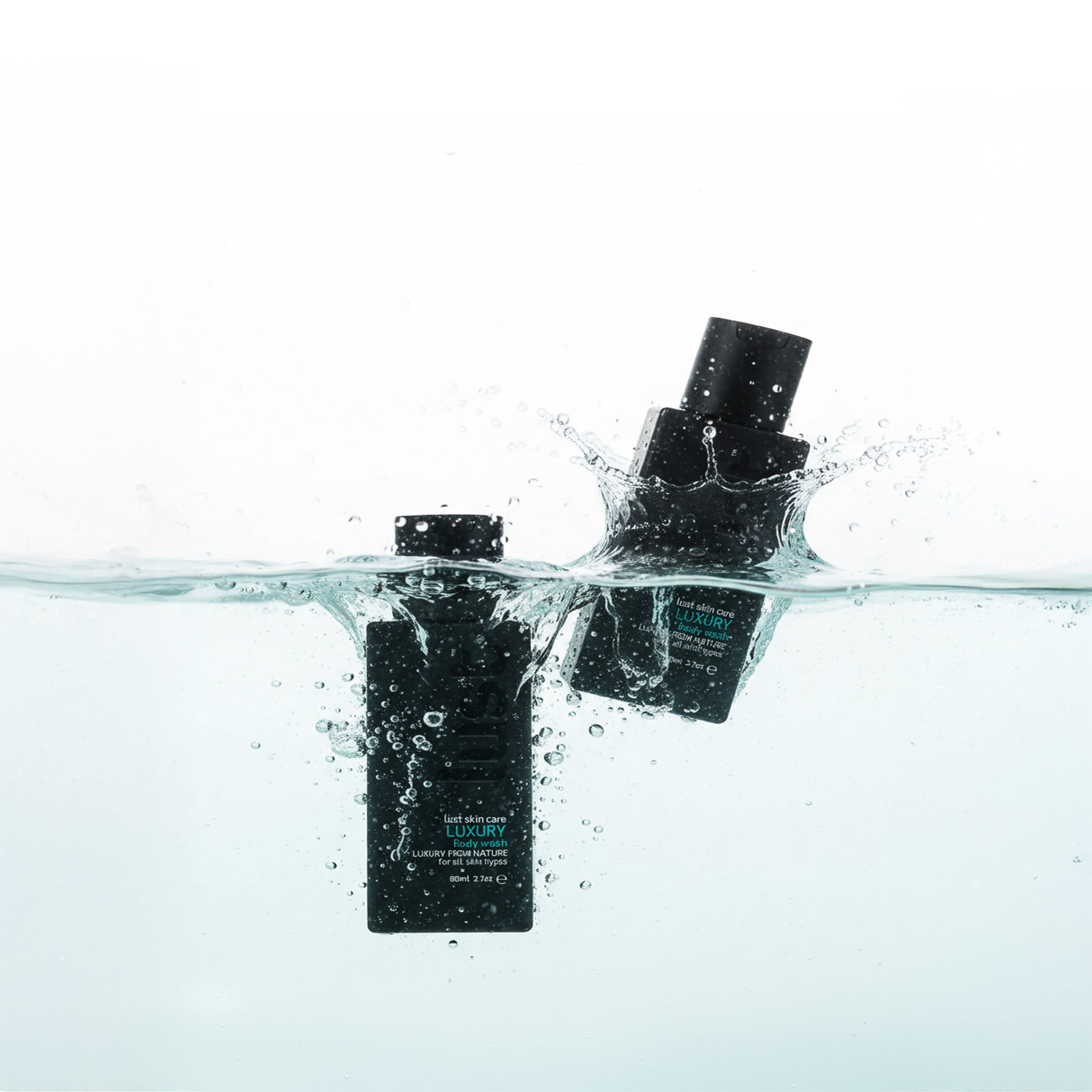 Lust hair product - travel size body wash in water