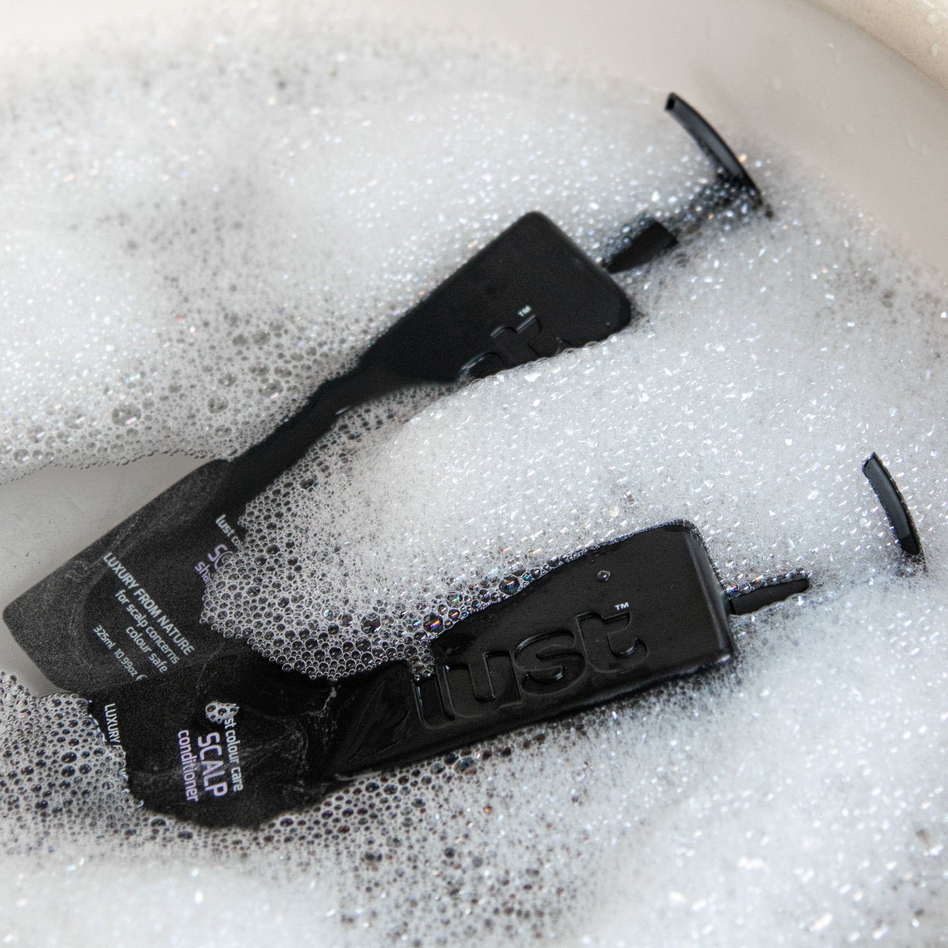 a scalp conditioner to help prevent dandruff and sooth itchy scalp by lust haircare 