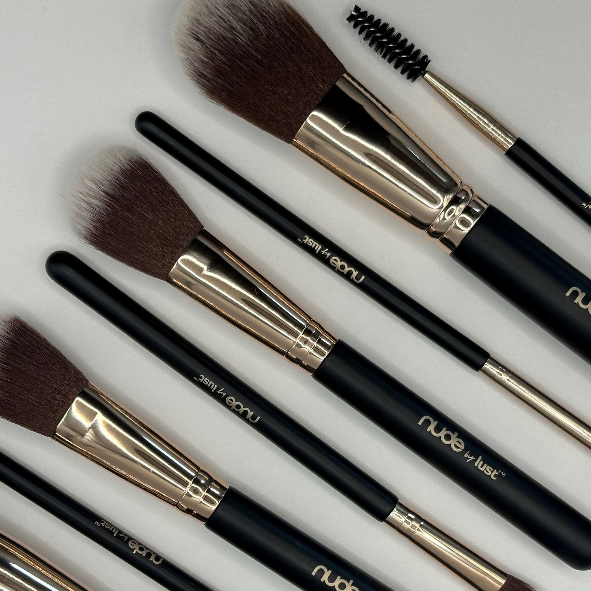 Collection of 9 makeup brushes by Lust Haircare