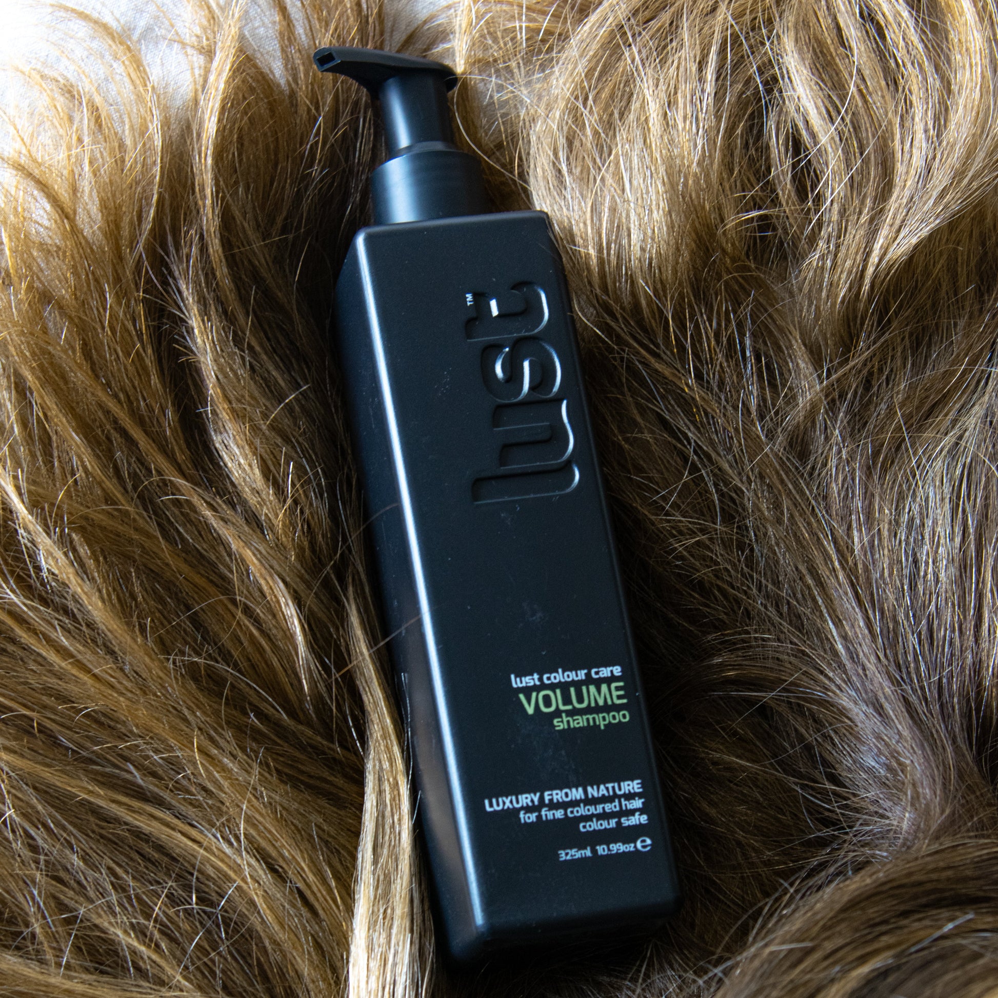 Bottle of our volume shampoo for fine hair by Lust Haircare NZ